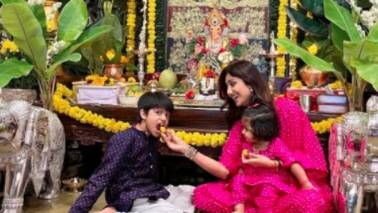 Shilpa Shetty Kundra celebrates Ganesh Chaturthi every year with her family. She shared pictures of herself with her two kids Viaan Raj Kundra and Samisha Shetty Kundra and an idol of Lord Ganesha.(Instagram/@theshilpashetty)
