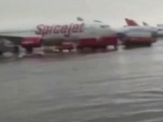 The flooded tarmac at Indira Gandhi International Airport in Delhi on Saturday morning. The flooded tarmac at Indira Gandhi International Airport in Delhi on Saturday morning.