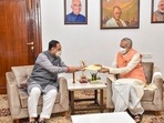 Gujarat Chief Minister Vijay Rupani submits his resignation letter to Governor Acharya Devvrat at Raj Bhavan in Gandhinagar on Saturday, (PTI) Gujarat Chief Minister Vijay Rupani submits his resignation letter to Governor Acharya Devvrat at Raj Bhavan in Gandhinagar on Saturday, (PTI)