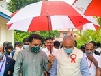 Telangana cabinet minister KT Rama Rao holds the umbrella over Tech Mahindra MD and CEO CP Gurnani and himself during the pair's recent meeting. (Twitter/CP Gurnani) Telangana cabinet minister KT Rama Rao holds the umbrella over Tech Mahindra MD and CEO CP Gurnani and himself during the pair's recent meeting. (Twitter/CP Gurnani)