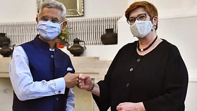 External Affairs Minister S Jaishankar welcomes Australian Foreign Minister Marise Payne with a fist bump in New Delhi on Saturday. Marise Payne along with Australian Defence Minister Peter Dutton arrived for a '2+2' ministerial dialogue. (ANI PHOTO.) External Affairs Minister S Jaishankar welcomes Australian Foreign Minister Marise Payne with a fist bump in New Delhi on Saturday. Marise Payne along with Australian Defence Minister Peter Dutton arrived for a '2+2' ministerial dialogue. (ANI PHOTO.)