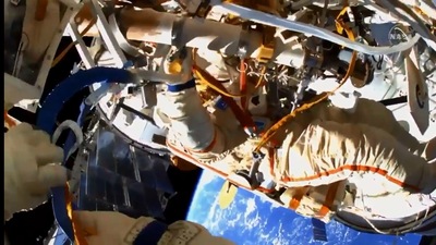 The image shows Russian cosmonauts conducting spacewalk, (Instagram/@iss)