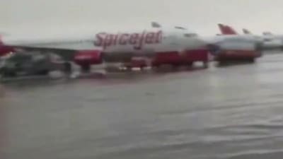 The flooded tarmac at Indira Gandhi International Airport in Delhi on Saturday morning. (ANI Photo) The flooded tarmac at Indira Gandhi International Airport in Delhi on Saturday morning. (ANI Photo)