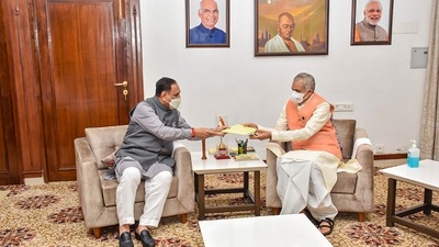 Gujarat Chief Minister Vijay Rupani submits his resignation letter to Governor Acharya Devvrat at Raj Bhavan in Gandhinagar on Saturday,&nbsp; (PTI)