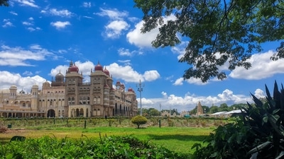 Mysore, a city located in Karnataka, is renowned for its opulent history and magnificent palaces. During your visit with your mother, you can explore the Mysore Palace, which is also called Amba Vilas Palace, and its stunning surrounding gardens. Additionally, you can visit nearby temples and indulge in some local cuisine. (Unsplash) Mysore, a city located in Karnataka, is renowned for its opulent history and magnificent palaces. During your visit with your mother, you can explore the Mysore Palace, which is also called Amba Vilas Palace, and its stunning surrounding gardens. Additionally, you can visit nearby temples and indulge in some local cuisine. (Unsplash)