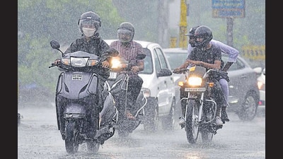 As always, the roads in Ludhiana were inundated with water after the rain. The rain brought down the mercury and provided relief from the scorching heat. (HT Photo)