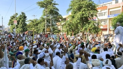 Farmers during a protest in Karnal on Wednesday. (ANI)