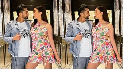 Gauahar left her locks open in a side parting with the dress, and for accessories, she chose gold hoop earrings, rings and gold strappy pumps. Her glam came together with winged eyeliner, blushed cheeks, pink lip shade, mascara-adorned lashes, and sharp contour. (Instagram/@gauaharkhan)