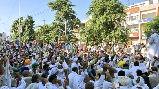 Farmers during a protest in Karnal on Wednesday. (ANI)