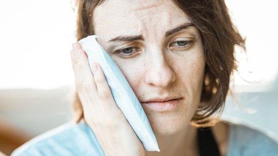 Throat or Jaw Pain: If you feel a pain in your chest that slowly moves to your jaw and throat then that could be a sign of a heart attack. (Unsplash)