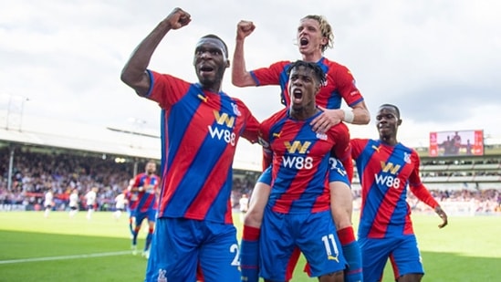 Wilfried Zaha celebrates with Christian Benteke, Conor Gallagher, Tyrick Mitchell after scoring a goal. (Getty) Wilfried Zaha celebrates with Christian Benteke, Conor Gallagher, Tyrick Mitchell after scoring a goal. (Getty)