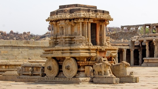 Hampi, Karnataka: The UNESCO-listed Hampi, is an ancient village that is known for its rock-cut temples. The best time to visit is between October to March.(Unsplash)