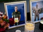 Photos of US Marine Corps sergeant Johanny Rosario Pichardo are seen at a makeshift memorial for the 13 US troops killed in Afghanistan.&nbsp;