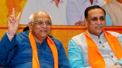 Newly elected Gujarat chief minister Bhupendra Patel shows victory sign in presence of his predecessor Vijay Rupani at the BJP headquarters in Gandhinagar on Sunday. (ANI file photo) Newly elected Gujarat chief minister Bhupendra Patel shows victory sign in presence of his predecessor Vijay Rupani at the BJP headquarters in Gandhinagar on Sunday. (ANI file photo)
