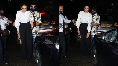 Deepika Padukone and Ranveer Singh spot a stranded slipper. (Varinder Chawla) Deepika Padukone and Ranveer Singh spot a stranded slipper. (Varinder Chawla)