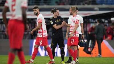 Bayern's Marcel Sabitzer shakes hands with Leipzig's Konrad Laimer at the end of the German Bundesliga soccer match between RB Leipzig and FC Bayern Munich (AP) Bayern's Marcel Sabitzer shakes hands with Leipzig's Konrad Laimer at the end of the German Bundesliga soccer match between RB Leipzig and FC Bayern Munich (AP)