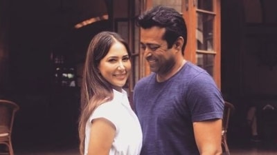Kim Sharma with Leander Paes. Kim Sharma with Leander Paes.