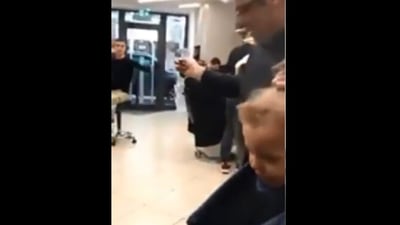 The image taken from the video shows the barbershop. (Screengrab)