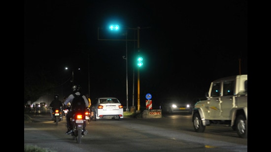 The timers indicate how many seconds are left before the traffic lights turn green. (Keshav SIngh/HT)