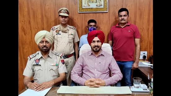 The accused in the custody of special task force, Ludhiana unit, on Sunday. (HT Photo)