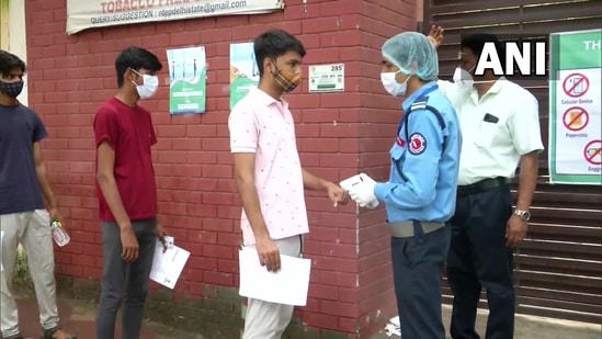 NEET 2021: Students arrive at exam centres(ANI) NEET 2021: Students arrive at exam centres(ANI)
