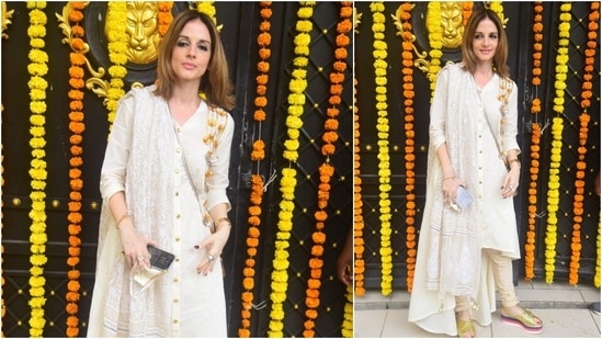 Sussanne Khan grabbed eyeballs as she posed for the camera in a white salwar suit.(HT Photo/Varinder Chawla)