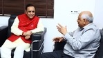 Bhupendra Patel meets former chief minister Vijay Rupani at his residence in Gandhinagar. (ANI Photo) Bhupendra Patel meets former chief minister Vijay Rupani at his residence in Gandhinagar. (ANI Photo)