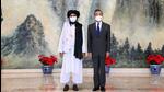 Chinese State Councilor and Foreign Minister Wang Yi meets with Mullah Abdul Ghani Baradar, political chief of Afghanistan's Taliban, in Tianjin, China, on July 28, 2021. China’s enhanced diplomatic efforts primarily focus on securing Xinjiang against any jihadist influence, and Beijing does not seem to have any intention to involve itself in the treacherous territory of Afghanistan based on miscalculations of power and interests. (VIA REUTERS) Chinese State Councilor and Foreign Minister Wang Yi meets with Mullah Abdul Ghani Baradar, political chief of Afghanistan's Taliban, in Tianjin, China, on July 28, 2021. China’s enhanced diplomatic efforts primarily focus on securing Xinjiang against any jihadist influence, and Beijing does not seem to have any intention to involve itself in the treacherous territory of Afghanistan based on miscalculations of power and interests. (VIA REUTERS)