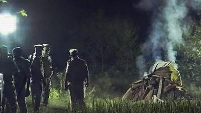 Hathras: Police personnel cremate the body of a 19-year-old Dalit woman who was gang-raped in the district last year. (PTI Photo) Hathras: Police personnel cremate the body of a 19-year-old Dalit woman who was gang-raped in the district last year. (PTI Photo)