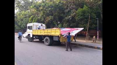 Officials said all these hoardings were put up without permission of Lucknow Municipal Corporation and were violating norms. (HT Photo)