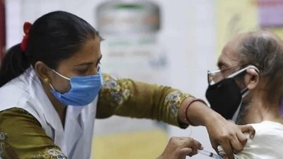 A health worker vaccinating a beneficiary (File Photo/PTI) A health worker vaccinating a beneficiary (File Photo/PTI)
