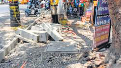 A footpath at Kothrud in Pune under repairs. Whether distributing bags or building roads or reconstructing the fairly new footpaths, the main interest for corporators – not just of the BJP but for all parties - is in awarding the contracts, and rent-seeking (HT FILE) A footpath at Kothrud in Pune under repairs. Whether distributing bags or building roads or reconstructing the fairly new footpaths, the main interest for corporators – not just of the BJP but for all parties - is in awarding the contracts, and rent-seeking (HT FILE)