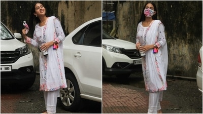 A pink, green, purple, blue and white floral print face mask served as a pretty and mandatory finishing touch. Sara wore embroidered multi-coloured juttis, left her tresses open in a middle parting, and opted for a bare face to complete her look. (HT Photo/Varinder Chawla)