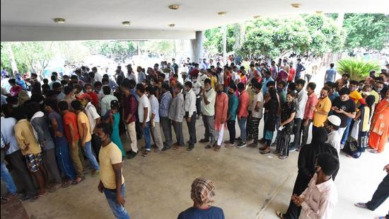 Large crowds at the Civil Hospital in Sector 10, as over 60,000 people were inoculated against Covid-19 as part of a statewide drive on Monday. (Vipin Kumar/HT PHOTO)