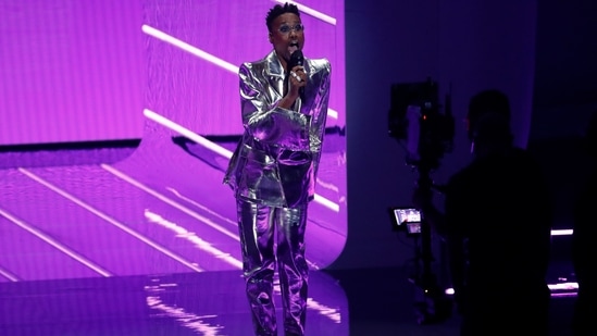 Billy Porter arrived at the MTV VMAs in a head-to-toe metallic ensemble by Christian Siriano. He accessorised the look with metallic platform boots, bedazzling jewellery, and bold eye make-up.&nbsp;(REUTERS)
