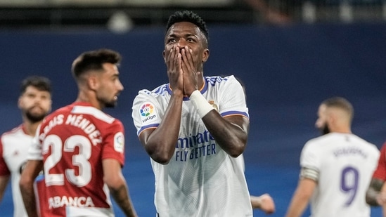 Real Madrid's Vinicius Junior reacts during the Spanish La Liga soccer match between Real Madrid and Celta de Vigo at the Bernabeu stadium in Madrid, Spain, Sunday, Sept. 12, 2021. (AP Photo/Manu Fernandez)(AP)