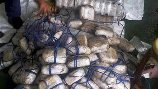 Another consignment of drugs, which was stored in Sultanwind in Amritsar district, was seized by STF and Punjab Police. The case registered by the STF is also being taken over by the NIA and further investigation is on. (HtTphoto)