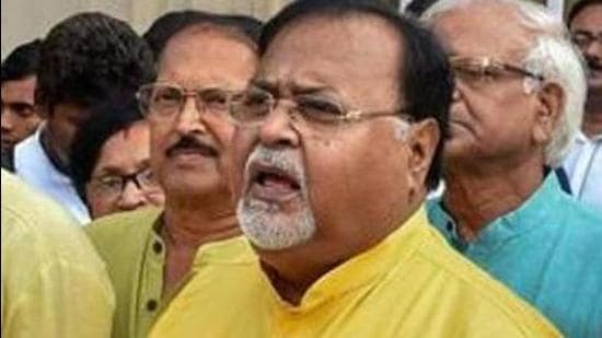 West Bengal minister Partha Chatterjee was allegedly seen with the chief of I-Core group, accused of money laundering. (Courtesy Photo: PTI) West Bengal minister Partha Chatterjee was allegedly seen with the chief of I-Core group, accused of money laundering. (Courtesy Photo: PTI)