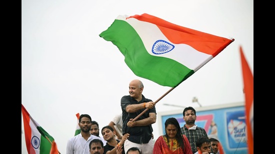 Delhi Deputy Chief Minister Manish Sisodia waving the National tri-colour flag during the 'Tiranga Yatra' organised by AAP party. The party is starting the yatra in Ayodhya from today. (FILE PHOTO) Delhi Deputy Chief Minister Manish Sisodia waving the National tri-colour flag during the 'Tiranga Yatra' organised by AAP party. The party is starting the yatra in Ayodhya from today. (FILE PHOTO)