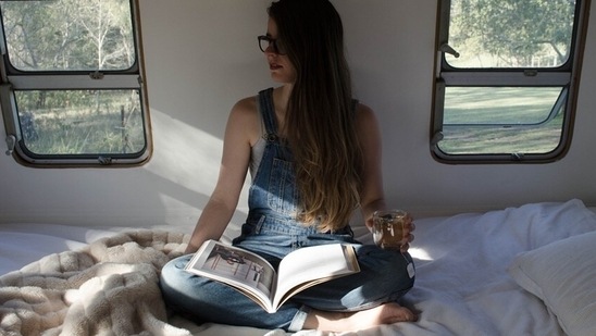 Read a book: Instead of binge-watching a web series, you can actually pick a book, which is a better way to unwind. Reading relaxes your mind. "One can do some light reading and then go to sleep only when you feel drowsy," says Dr. Sonal Anand, Psychiatrist, Wockhardt Hospital, Mumbai.(Unsplash)
