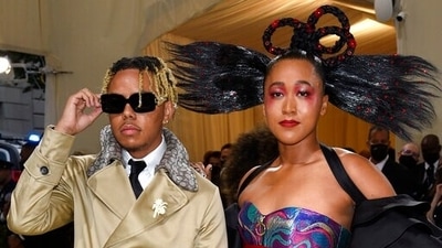 Naomi Osaka attends first Met Gala with boyfriend Cordae in custom Louis Vuitton dress (Invision) Naomi Osaka attends first Met Gala with boyfriend Cordae in custom Louis Vuitton dress (Invision)