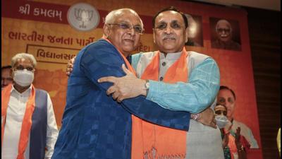 (From left) Bhupendra Patel with Vijay Rupani who he succeeded as the chief minister of Gujarat. (File photo)