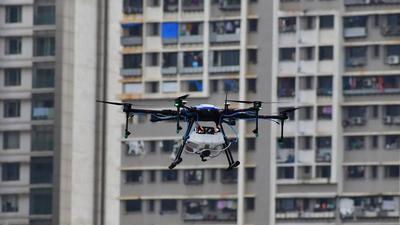 BMC workers fumigate Dhobi Ghat using a drone as part of the precautionary measures to prevent the spread of dengue and malaria during monsoon. (HT PHOTO) BMC workers fumigate Dhobi Ghat using a drone as part of the precautionary measures to prevent the spread of dengue and malaria during monsoon. (HT PHOTO)