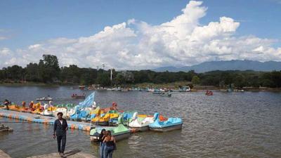 Cloudy weather before rain at Sukhna Lake in Chandigarh on Tuesday. (Keshav Singh/HT)