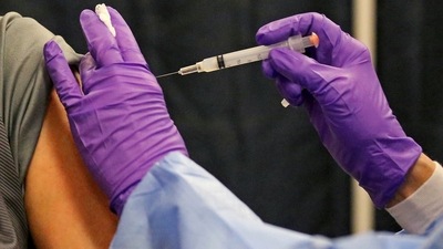 A report published in the medical journal Lancet said that a booster dose was not needed for fully vaccinated individuals. (AP)