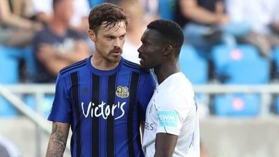 German football player Dennis Erdmann (left) banned 8 weeks for racist abuse (TWITTER)