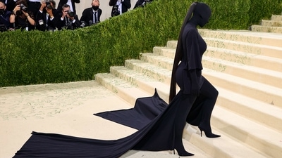 Reality TV star Kim Kardashian wore an all-black head-to-toe Balenciaga ensemble that covered her face. (AFP) 