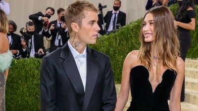 Justin Bieber and Hailey Bieber chose all-black outfits for their first Met Gala together. The couple were totally in love and earnestly looked into each other's eyes as they walked the red carpet hand-in-hand. Justin wore a dark suit with a Drew suitcase, and Hailey wore a black column gown with a plunging neckline from Saint Laurent. (AFP) Justin Bieber and Hailey Bieber chose all-black outfits for their first Met Gala together. The couple were totally in love and earnestly looked into each other's eyes as they walked the red carpet hand-in-hand. Justin wore a dark suit with a Drew suitcase, and Hailey wore a black column gown with a plunging neckline from Saint Laurent. (AFP)