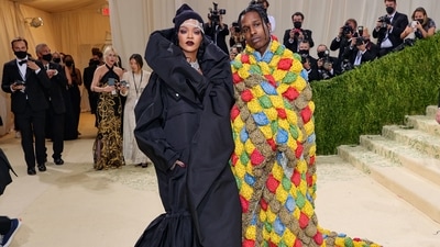 Rihanna and A$AP Rocky arrived fashionably late at the 2021 Met Gala celebrating In America: A Lexicon Of Fashion at Metropolitan Museum of Art on September 13, 2021. However, the couple did not disappoint as they shared some romantic glances and adorable banter while walking the Met red carpet in the most comfortable ensembles of the night. A$AP chose a giant quilt from ERL’s spring 2022 collection over a tuxedo, and Rihanna wore Balenciaga. (AFP) Rihanna and A$AP Rocky arrived fashionably late at the 2021 Met Gala celebrating In America: A Lexicon Of Fashion at Metropolitan Museum of Art on September 13, 2021. However, the couple did not disappoint as they shared some romantic glances and adorable banter while walking the Met red carpet in the most comfortable ensembles of the night. A$AP chose a giant quilt from ERL’s spring 2022 collection over a tuxedo, and Rihanna wore Balenciaga. (AFP)