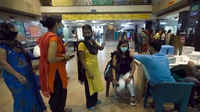 A woman being vaccinated against Covid-19 at Sector 30 district hospital, in Noida on September 9. (HT file) A woman being vaccinated against Covid-19 at Sector 30 district hospital, in Noida on September 9. (HT file)